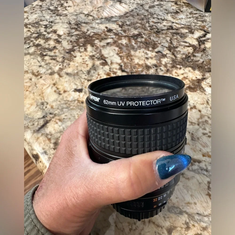 Used Nikon AF 60mm Micro 2.8 w caps UV pro lens filter like new